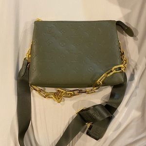 Green crossbody bag with removable straps